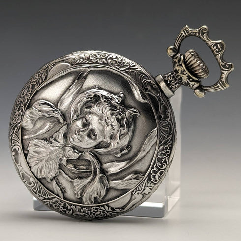 Antique Swiss made unsigned pocket watch with embossed silver plate case works well